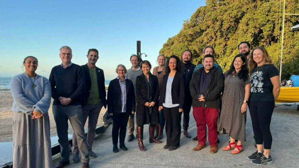 Dec comm group shot with chair